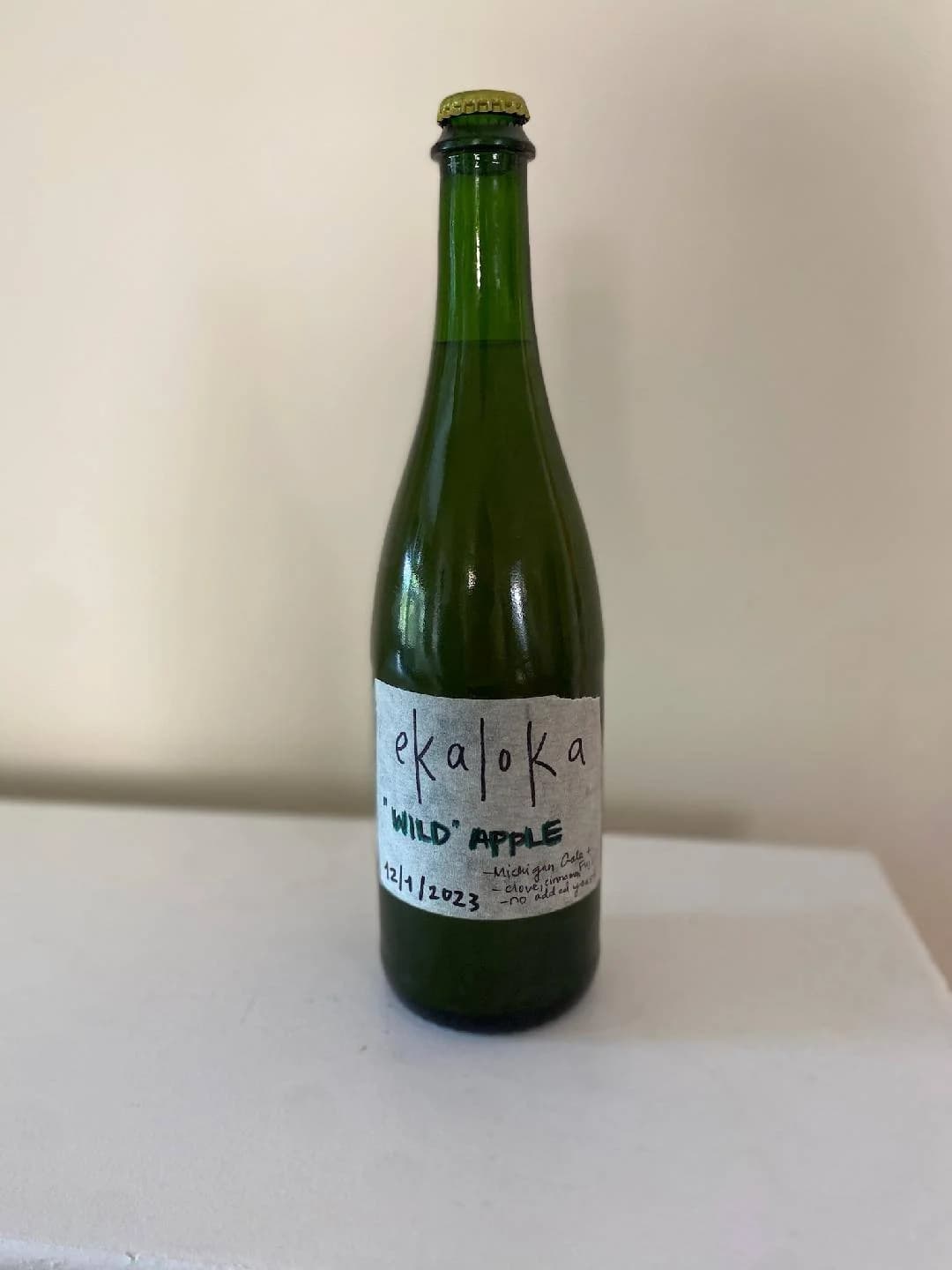 A bottle of wild apple cider -- made with fresh pressed appl...